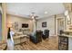 Cozy living room featuring wood-look tile, modern furniture, and a neutral color palette at 16246 26Th E St, Parrish, FL 34219