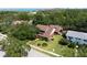 Aerial view of a luxury home and its manicured landscaping at 1671 South Dr, Sarasota, FL 34239