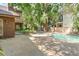 Inviting backyard featuring a refreshing swimming pool and a patio area at 1671 South Dr, Sarasota, FL 34239