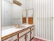 Bathroom featuring a vanity with storage at 1671 South Dr, Sarasota, FL 34239
