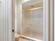 Bathroom featuring a shower with a glass door at 1671 South Dr, Sarasota, FL 34239