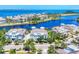 Panoramic aerial view of a coastal community featuring homes with lake access and well-manicured landscaping at 262 Sapphire Lake Dr # 202, Bradenton, FL 34209