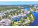 A stunning aerial perspective of a residential community nestled along a scenic lake at 262 Sapphire Lake Dr # 202, Bradenton, FL 34209