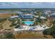 Breathtaking aerial view highlighting resort-style amenities, stunning community, and waterfront location at 262 Sapphire Lake Dr # 202, Bradenton, FL 34209
