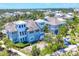 Birds-eye view of a luxury community surrounded by lush greenery and winding walkways at 262 Sapphire Lake Dr # 202, Bradenton, FL 34209