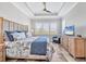 Bright bedroom with trey ceilings, shuttered windows and coastal decor and furnishings at 262 Sapphire Lake Dr # 202, Bradenton, FL 34209