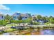 Waterfront community featuring manicured landscaping and picturesque walking paths at 262 Sapphire Lake Dr # 202, Bradenton, FL 34209