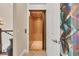 An elevator with a tile floor and wood interior and doors provides convenience for getting around the home at 262 Sapphire Lake Dr # 202, Bradenton, FL 34209