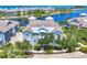 Charming two-story coastal home featuring a lake view and lush landscaping in a desirable neighborhood at 262 Sapphire Lake Dr # 202, Bradenton, FL 34209