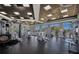 Bright gym with modern exercise machines offers stunning views of the water and beautiful blue skies at 262 Sapphire Lake Dr # 202, Bradenton, FL 34209
