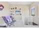 Cozy landing area with modern decor, spiral staircase access, and natural light at 262 Sapphire Lake Dr # 202, Bradenton, FL 34209