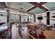 Spacious lounge area with nautical decor, comfortable seating, and a bar, perfect for relaxing and socializing at 262 Sapphire Lake Dr # 202, Bradenton, FL 34209