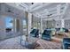 Inviting lounge area with plush seating, scenic views, and abundant natural light, perfect for relaxation and socializing at 262 Sapphire Lake Dr # 202, Bradenton, FL 34209
