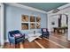 Charming lounge featuring nautical decor, comfortable seating, and a pool table, creating a relaxing atmosphere at 262 Sapphire Lake Dr # 202, Bradenton, FL 34209