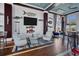 Bright lounge area featuring nautical decor, comfortable seating, and stylish furnishings, ideal for social gatherings at 262 Sapphire Lake Dr # 202, Bradenton, FL 34209