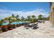 The poolside patio boasts comfortable seating areas and gorgeous, lush landscaping for relaxing and unwinding at 262 Sapphire Lake Dr # 202, Bradenton, FL 34209