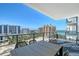 Spacious balcony featuring city views and outdoor seating area at 301 Quay Commons # 1208, Sarasota, FL 34236