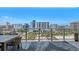 Relax on this condo's private balcony with city views at 301 Quay Commons # 1208, Sarasota, FL 34236