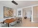 Modern dining room boasting sleek lines and contemporary lighting fixtures at 301 Quay Commons # 1208, Sarasota, FL 34236