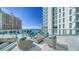 Cozy fire pit seating area with great Gulf views at 301 Quay Commons # 1208, Sarasota, FL 34236