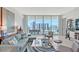 Inviting living room with stylish furnishings, large windows, and scenic views at 301 Quay Commons # 1208, Sarasota, FL 34236