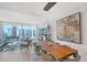 Bright, open-concept living space with floor-to-ceiling windows and elegant furnishings at 301 Quay Commons # 1208, Sarasota, FL 34236