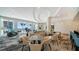 Bright, airy lobby with modern furnishings, views of the pool, and comfortable seating at 301 Quay Commons # 1208, Sarasota, FL 34236