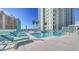 Relax in this outdoor pool, and enjoy views of the city at 301 Quay Commons # 1208, Sarasota, FL 34236
