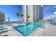 Enjoy this outdoor pool with an incredible view of the water at 301 Quay Commons # 1208, Sarasota, FL 34236