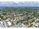 Aerial view of the property with a picturesque neighborhood, showcasing its location within the community at 310 Avenida Milano, Sarasota, FL 34242