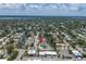 Aerial view of the property with a picturesque neighborhood, showcasing its location within the community at 310 Avenida Milano, Sarasota, FL 34242