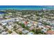 Aerial view of the property with a picturesque neighborhood, showcasing its location within the community at 310 Avenida Milano, Sarasota, FL 34242
