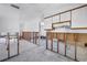 Open kitchen area awaiting remodel, showcasing an efficient layout with potential for modern upgrades and customization at 310 Avenida Milano, Sarasota, FL 34242