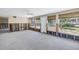 Open living area with large windows offering plenty of natural light, ready for a complete renovation at 310 Avenida Milano, Sarasota, FL 34242