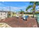 Backyard firepit area, great for relaxing or entertaining outdoors with lots of space at 3311 Florida Blvd, Bradenton, FL 34207