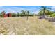Spacious backyard with shed and gate, offering privacy and room for outdoor activities at 3311 Florida Blvd, Bradenton, FL 34207