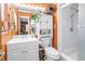 Bathroom featuring a stall shower, white cabinet and decor at 3311 Florida Blvd, Bradenton, FL 34207