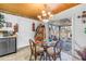 Bright dining area with a chandelier and glass table, adjacent to the kitchen area at 3311 Florida Blvd, Bradenton, FL 34207