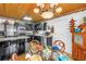 Bright kitchen and dining area with a chandelier, glass table, and dark cabinets at 3311 Florida Blvd, Bradenton, FL 34207