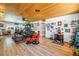 Comfortable living area with ample seating, wood flooring, and a unique decor at 3311 Florida Blvd, Bradenton, FL 34207