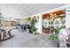 Spacious screened-in lanai with ample seating, perfect for entertaining and enjoying the outdoors at 3311 Florida Blvd, Bradenton, FL 34207