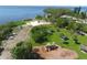 Aerial view of the park, showcasing playground, green space, and picnic areas near the water at 3311 Florida Blvd, Bradenton, FL 34207