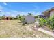 Well-maintained storage shed with double doors, providing ample space for tools and equipment at 3311 Florida Blvd, Bradenton, FL 34207