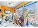 Cozy sunroom filled with natural light and views of the outdoors, perfect for relaxing and enjoying the scenery at 3311 Florida Blvd, Bradenton, FL 34207