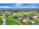 Scenic aerial view of a golf community featuring well-manicured grounds, water features, and attractive homesites at 3388 Highlands Bridge Rd, Sarasota, FL 34235