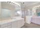Bathroom with a standing shower, and a view to the walk-in closet at 3388 Highlands Bridge Rd, Sarasota, FL 34235