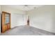 Bright bedroom with double door closet and hardwood cabinet at 3388 Highlands Bridge Rd, Sarasota, FL 34235