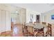 Elegant dining room with plenty of room to comfortably host a large dinner party at 3388 Highlands Bridge Rd, Sarasota, FL 34235