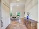 Inviting entryway leading to the dining room with unique tile flooring at 3388 Highlands Bridge Rd, Sarasota, FL 34235