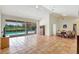 Spacious living room featuring tile flooring and an open floor plan at 3388 Highlands Bridge Rd, Sarasota, FL 34235